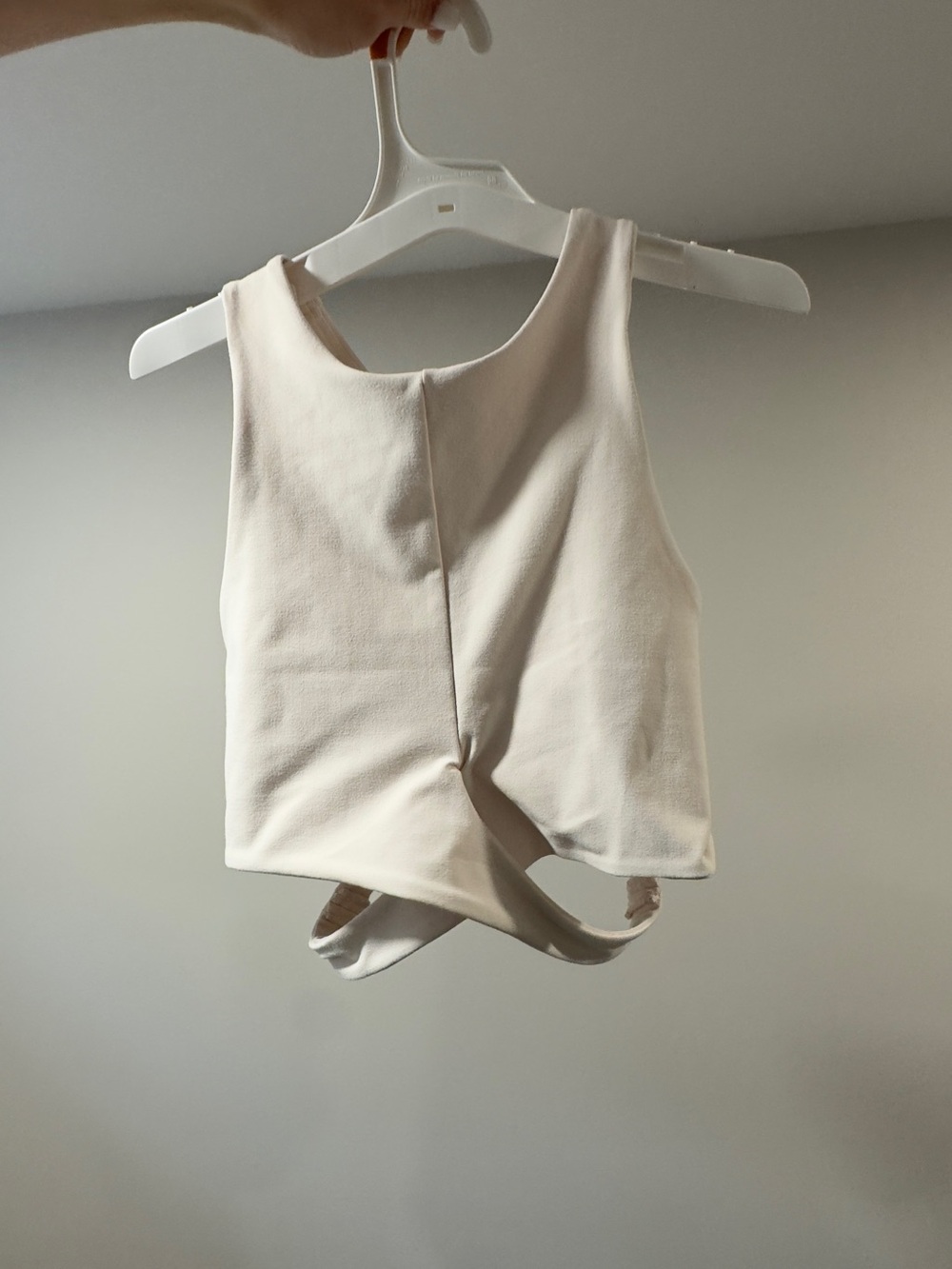 Cream Sleeveless Crop Top with Twist-Back Detail